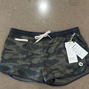 NWT Vuori Tavi shorts in green camo. Size large.